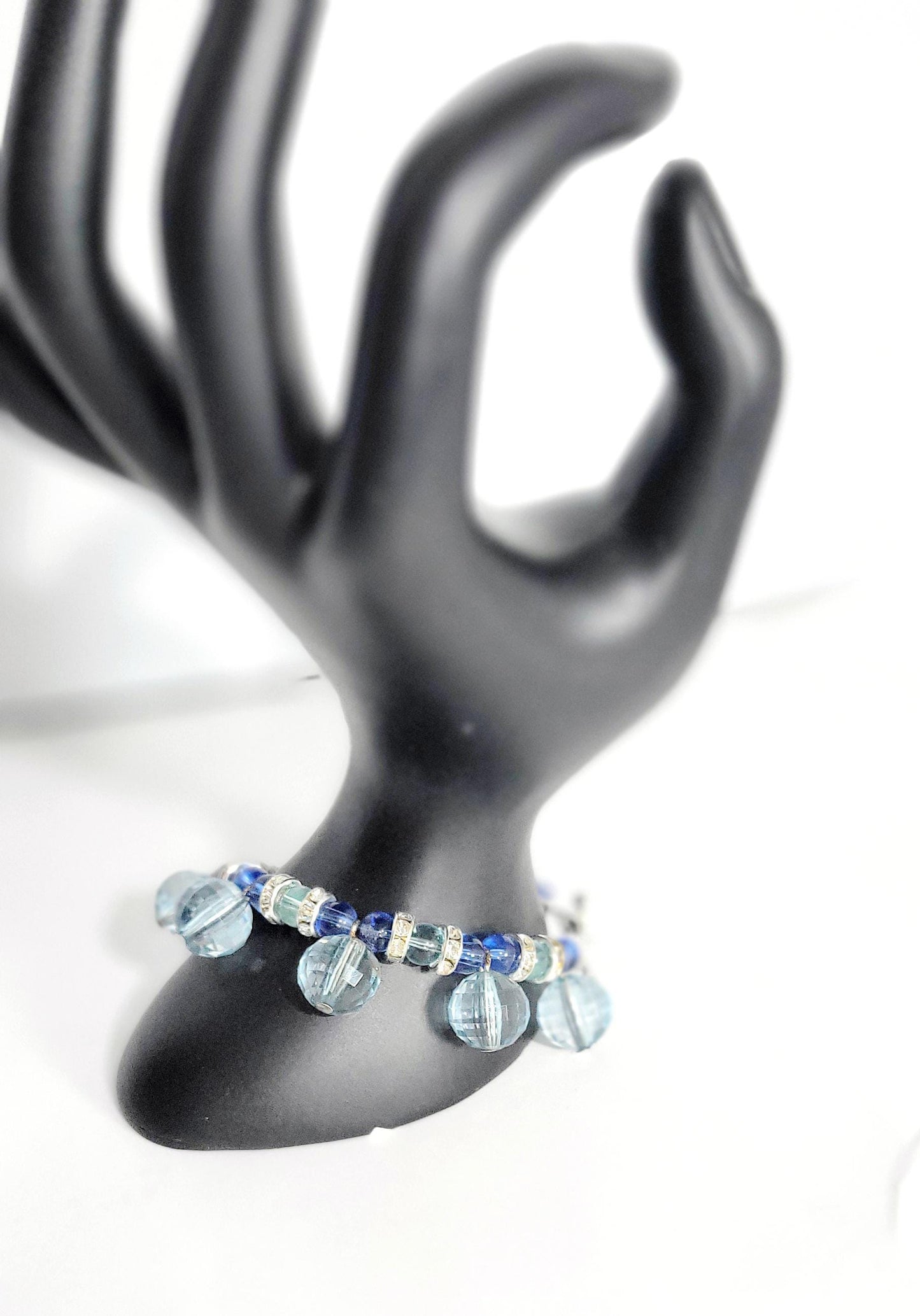 Blue glass beaded bracelet with rhinestone accents