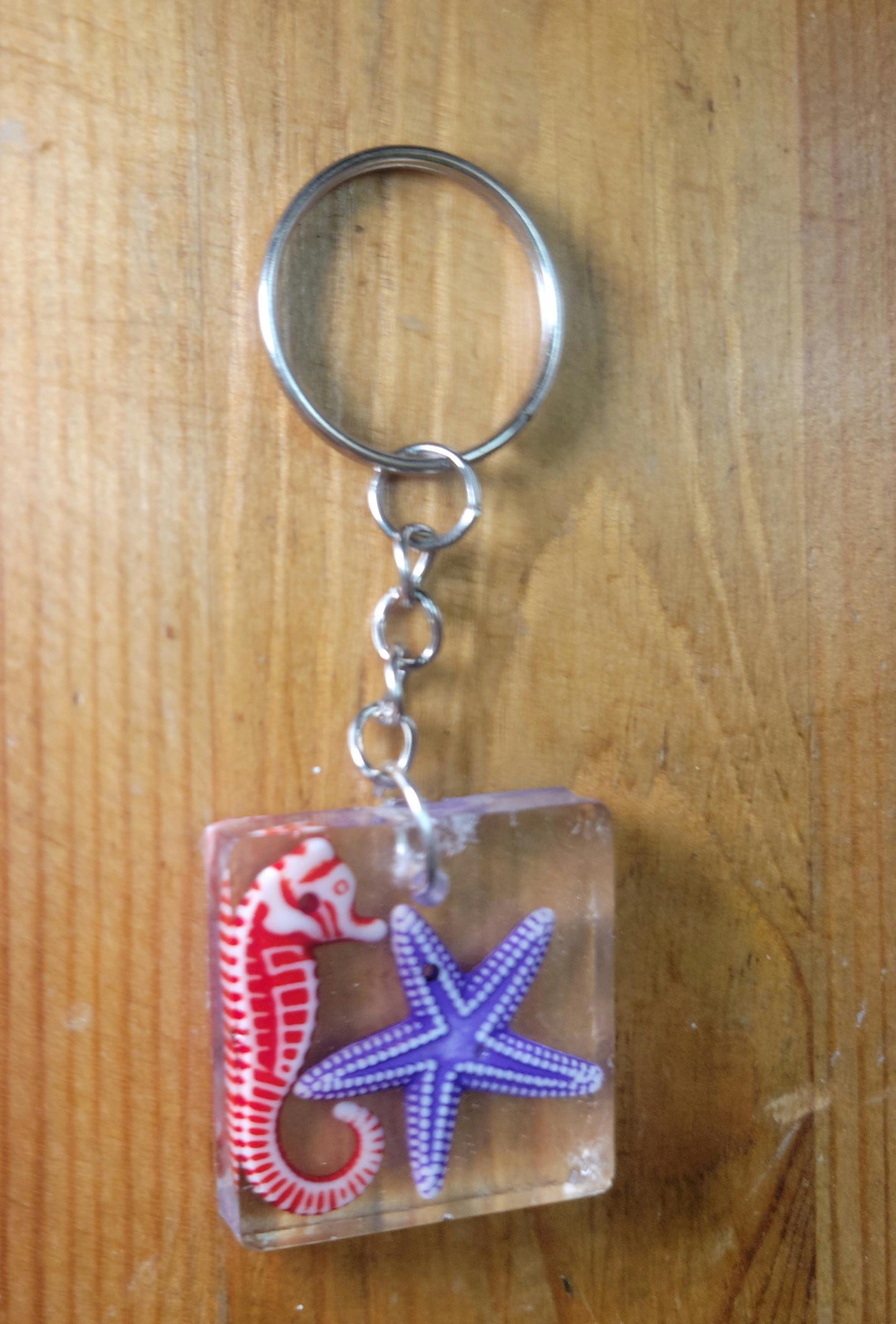 Seahorse and starfish resin keychain