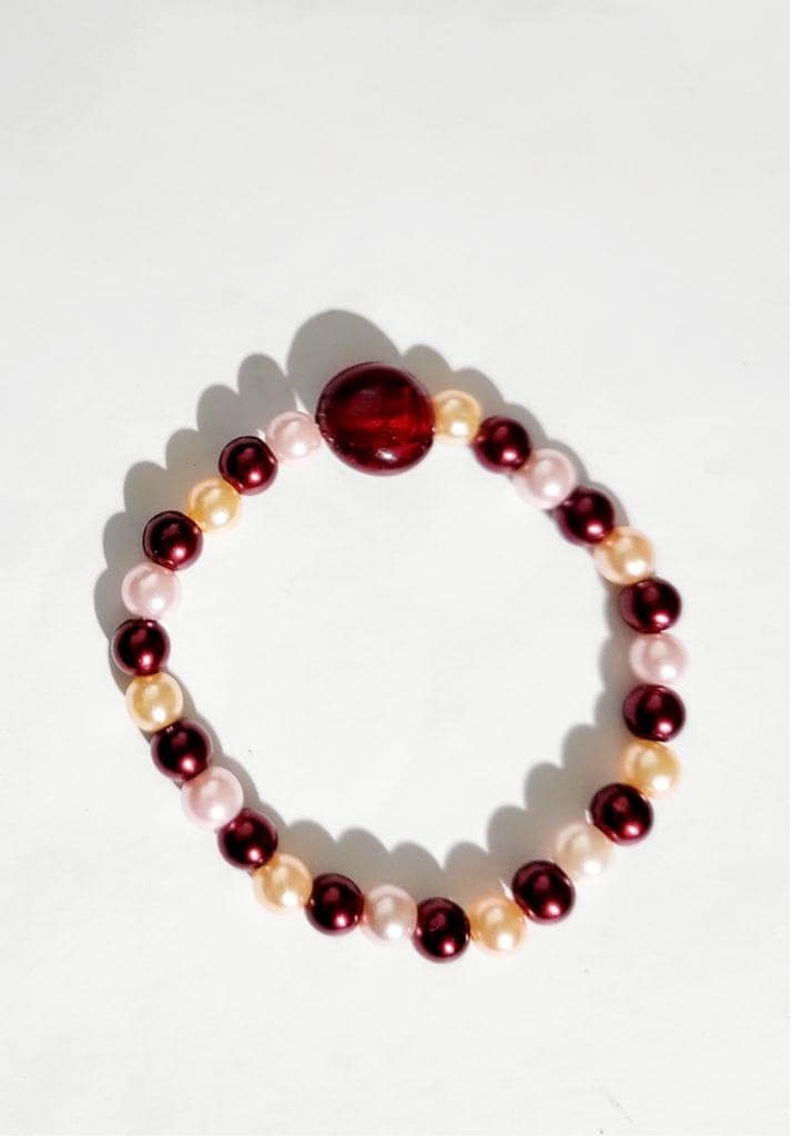 Pearlescent glass and cherry beaded bracelet hand crafted