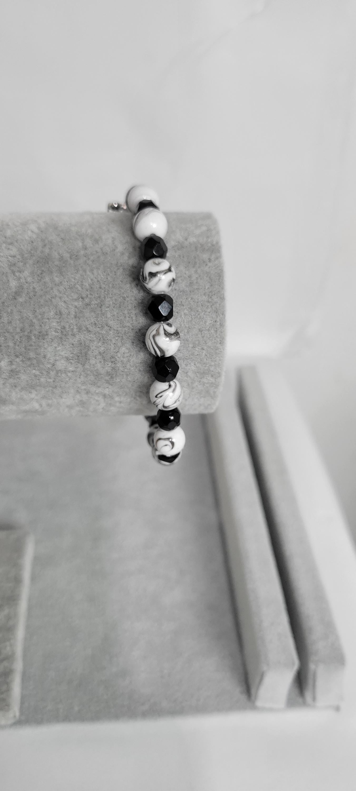 Hand crafted black & white crackle beaded skeleton charm bracelet