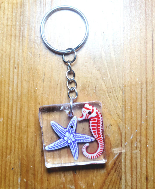 Seahorse and starfish resin keychain