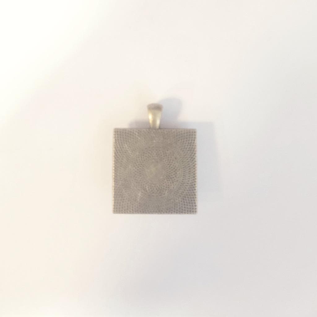 Rose resin bronze tone pendant