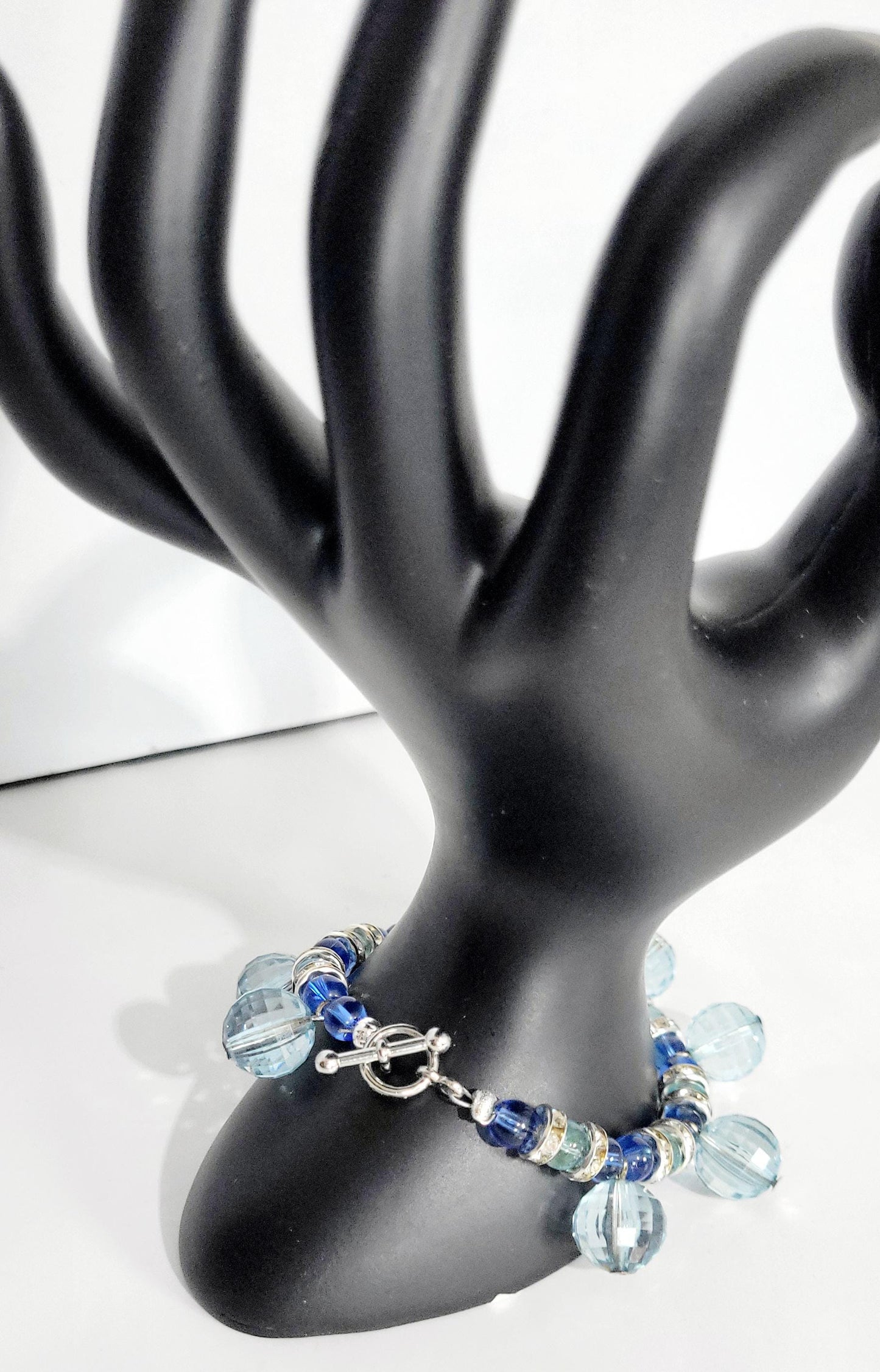 Blue glass beaded bracelet with rhinestone accents