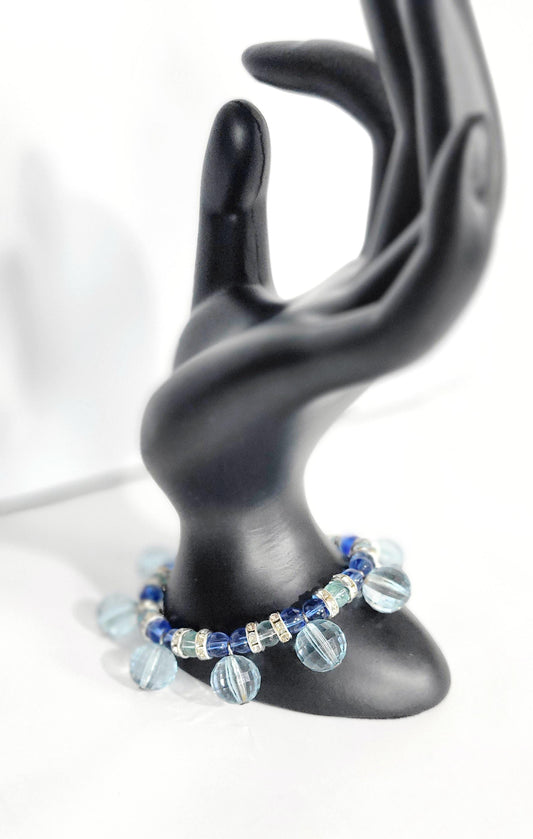 Blue glass beaded bracelet with rhinestone accents
