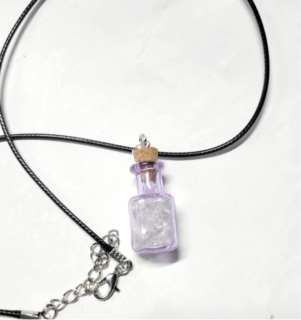 Hand crafted natural clear quartz crystal in mini wish bottle necklace