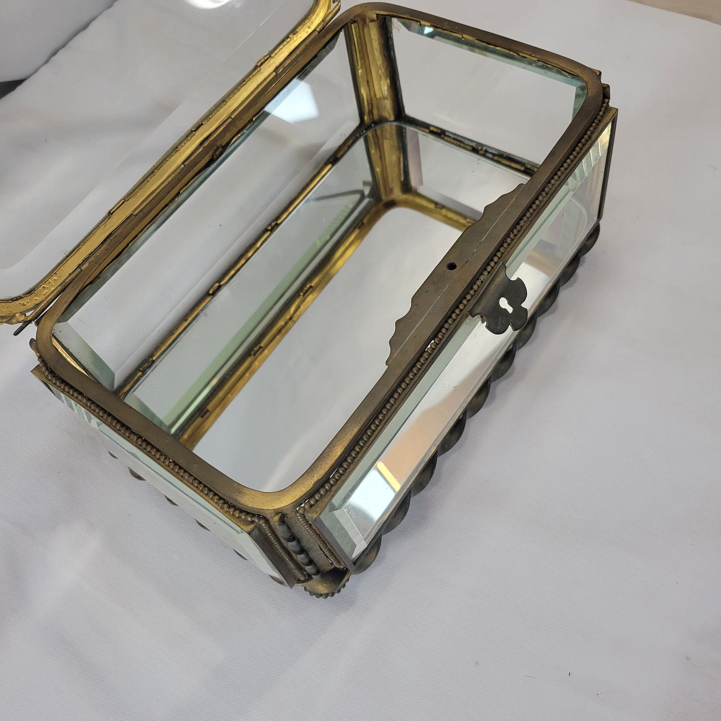 Antique French brass and glass footed jewelry box