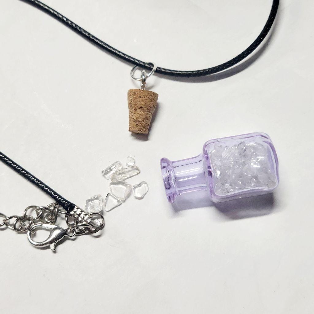 Hand crafted natural clear quartz crystal in mini wish bottle necklace
