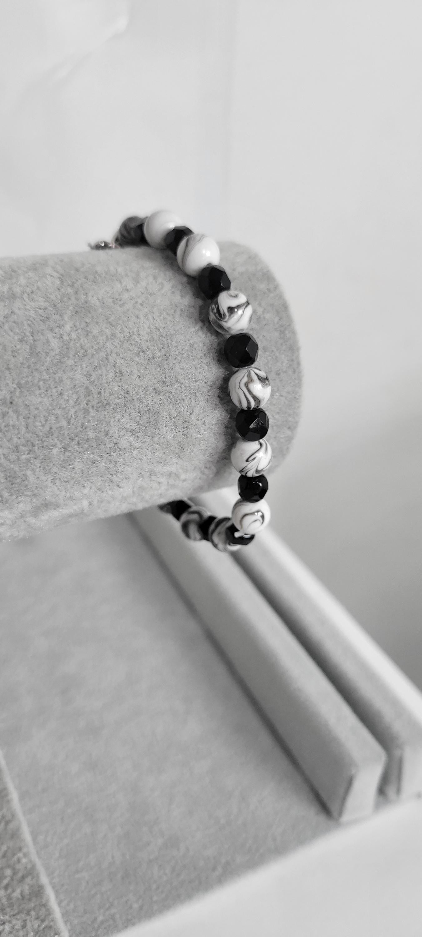 Hand crafted black & white crackle beaded skeleton charm bracelet