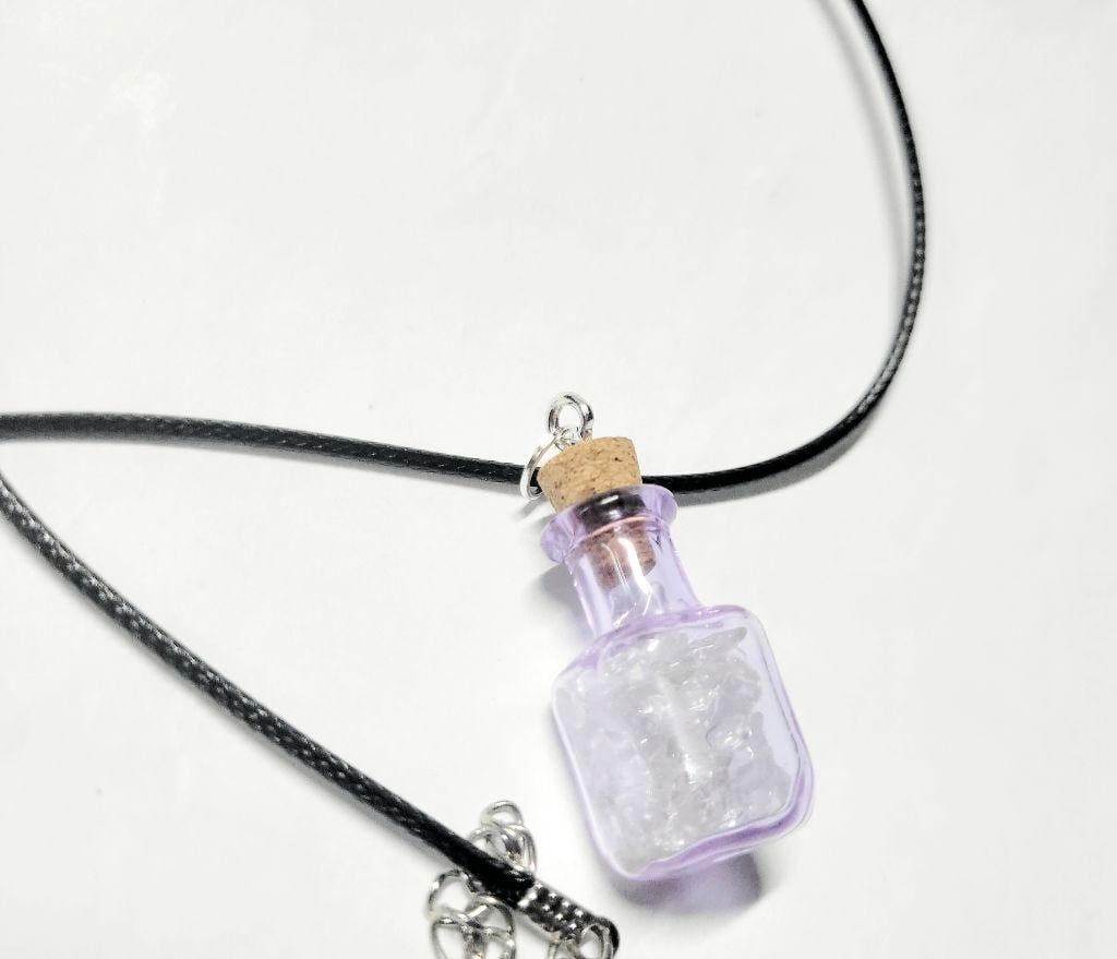 Hand crafted natural clear quartz crystal in mini wish bottle necklace