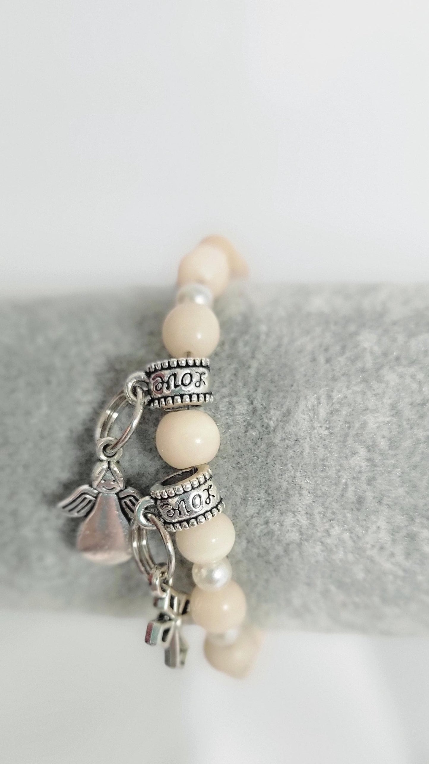 Angel themed glass beaded bracelet