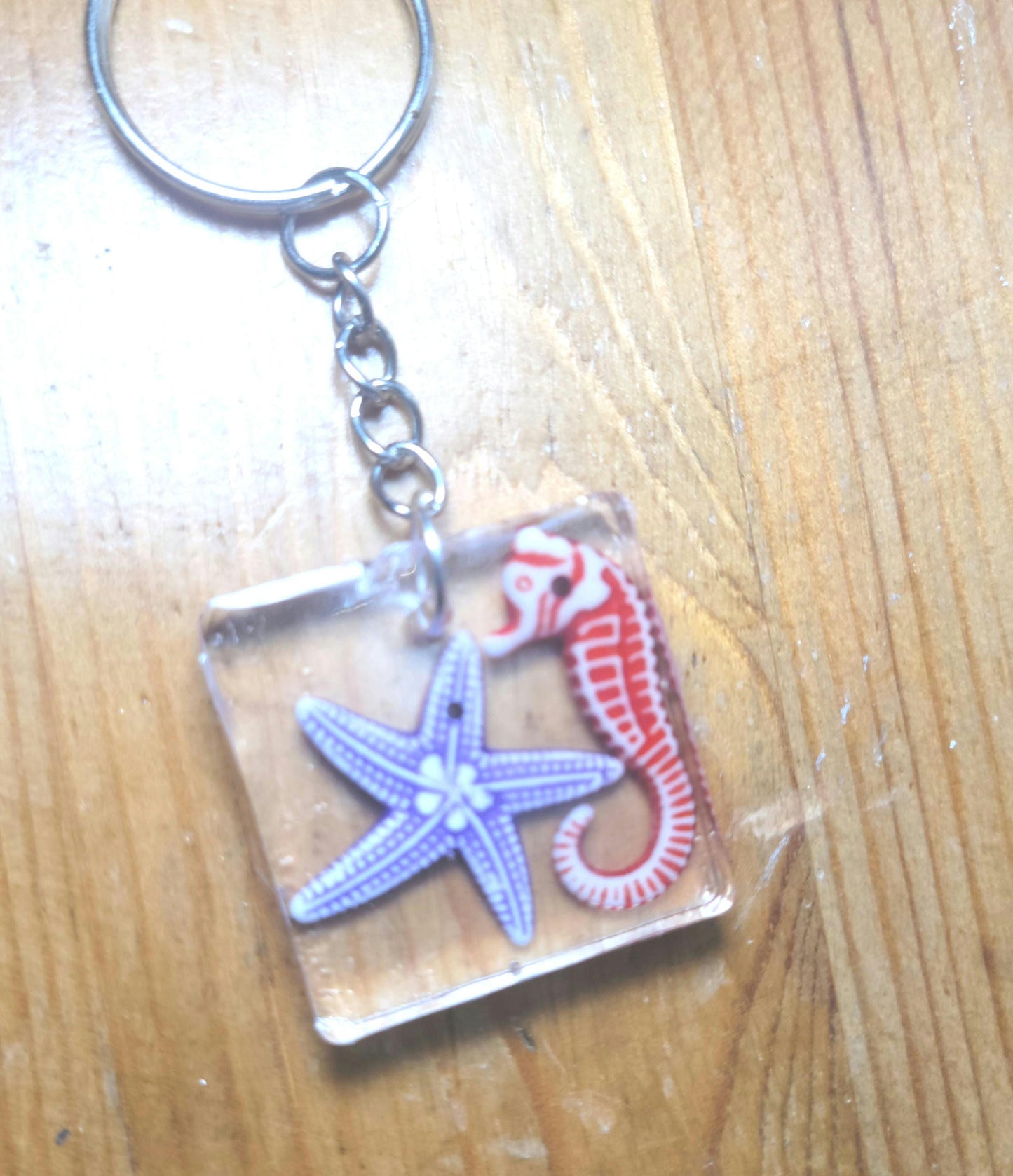 Seahorse and starfish resin keychain
