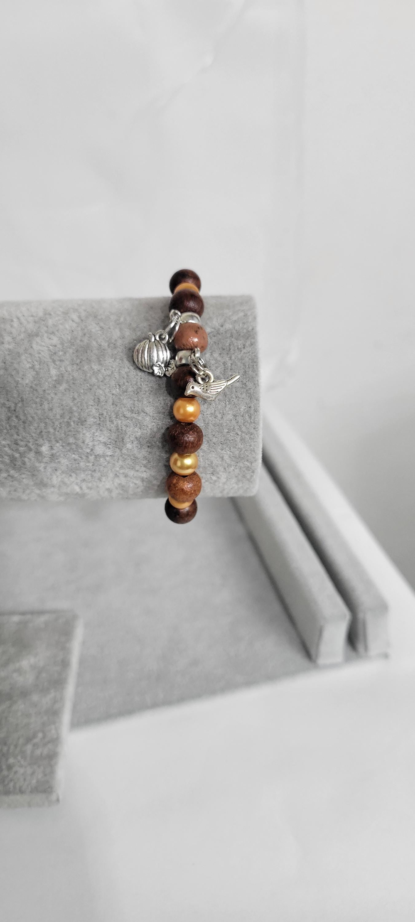 Autumn Fall glass and wood beaded pumpkin and bird charm bracelet