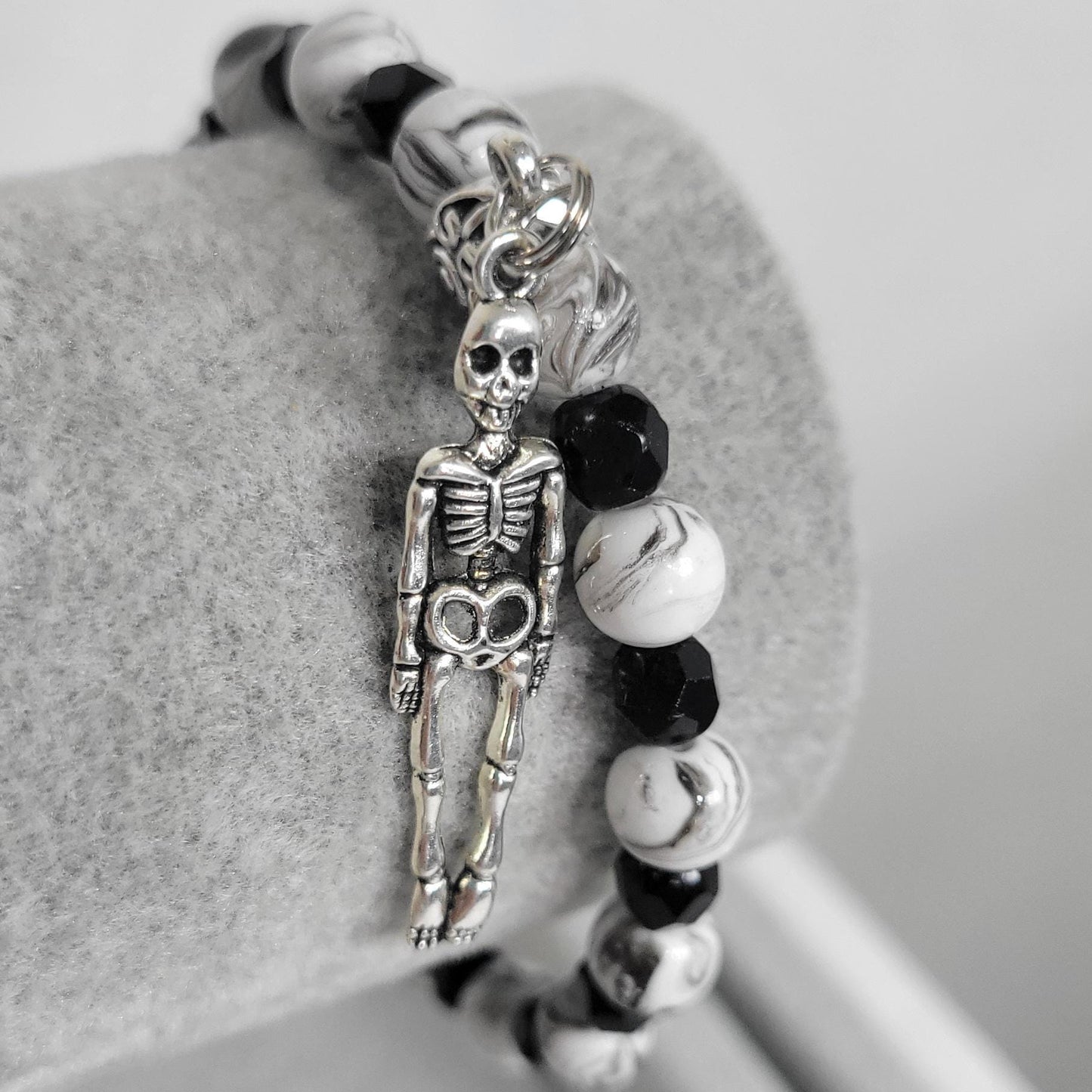 Hand crafted black & white crackle beaded skeleton charm bracelet