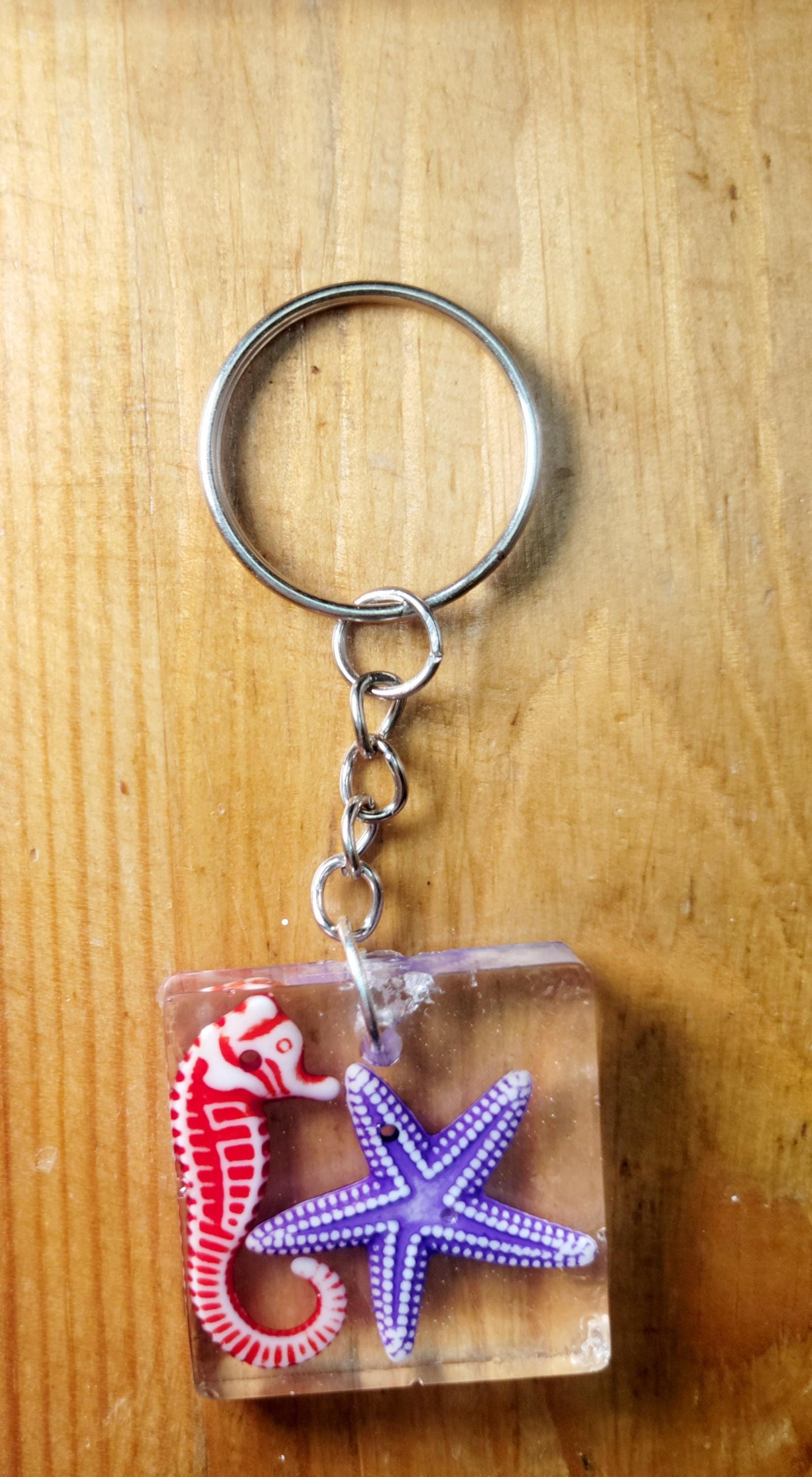 Seahorse and starfish resin keychain