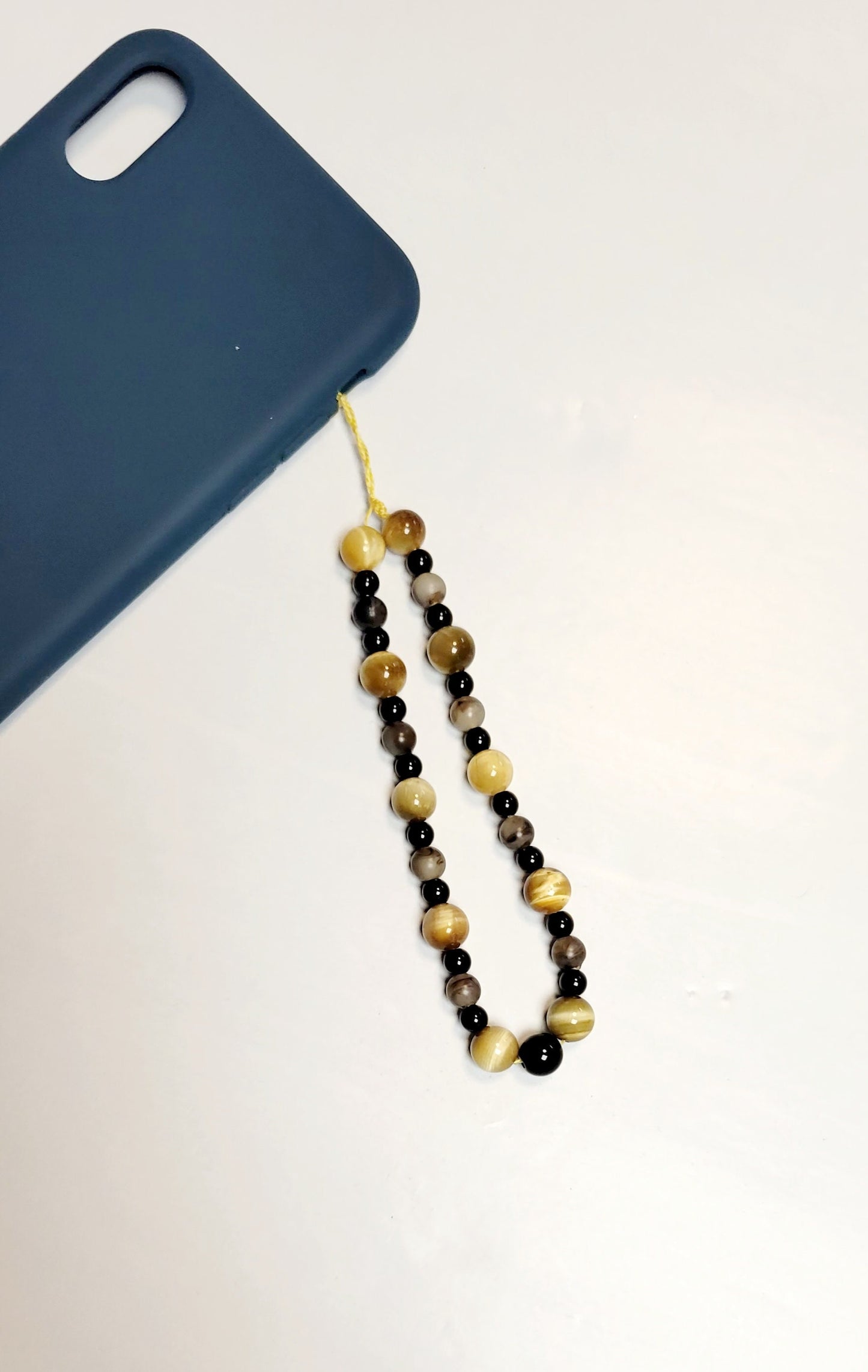 Cellphone charm strap wristlet accessory