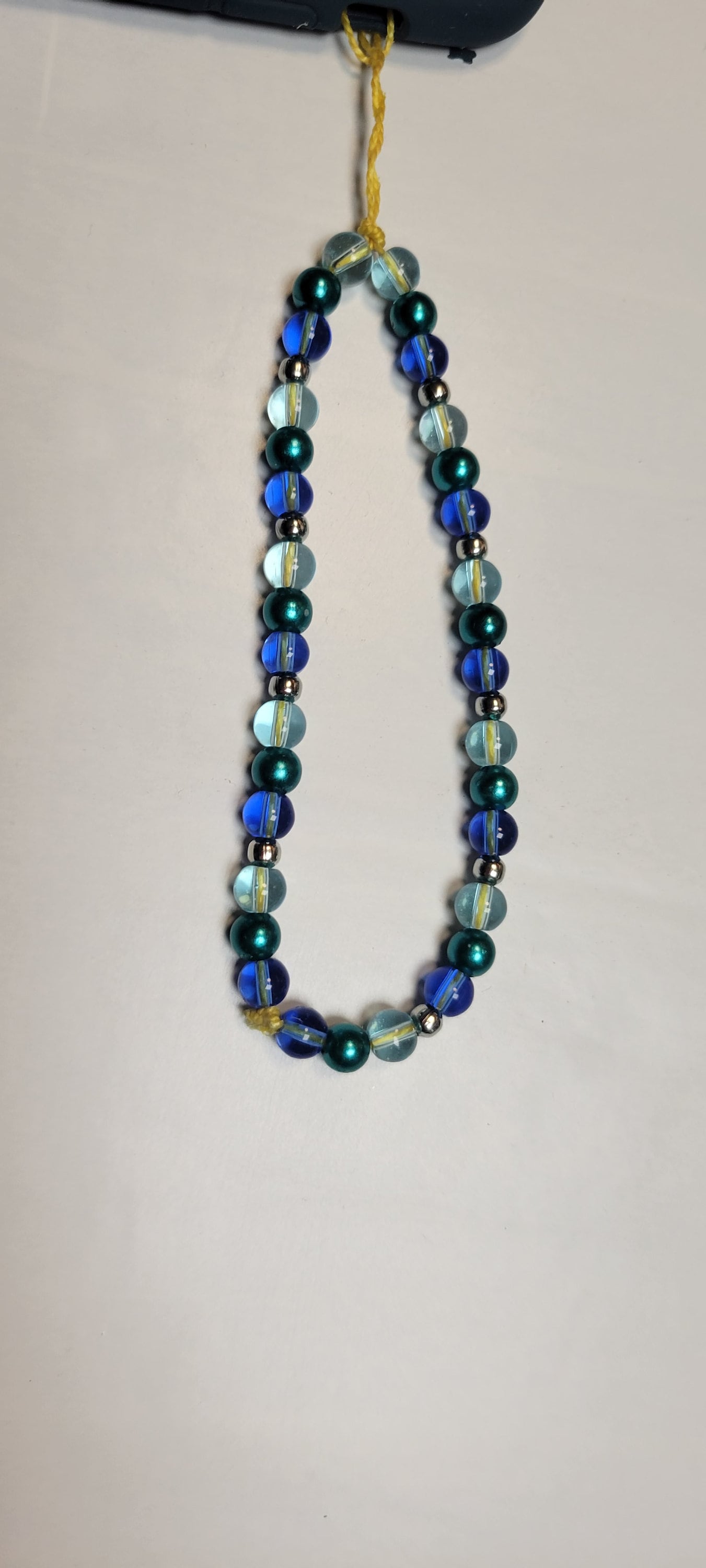 Cellphone charm strap wristlet accessory