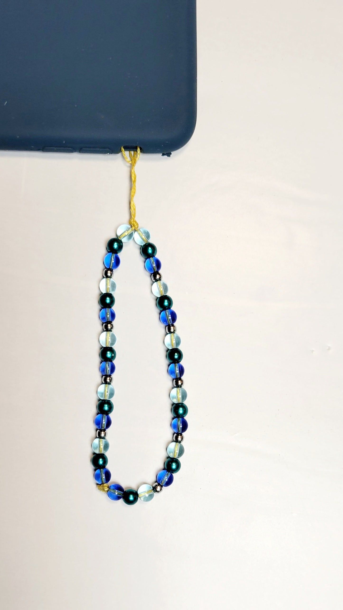 Cellphone charm strap wristlet accessory