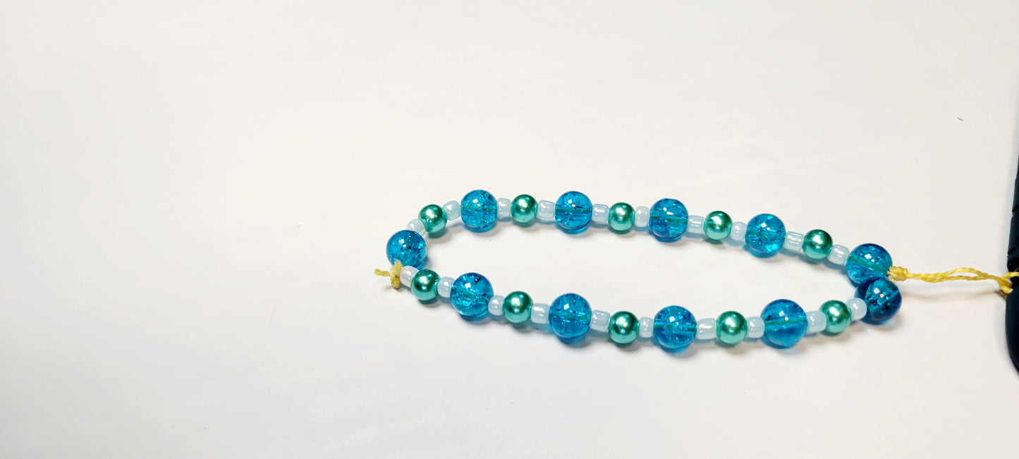 Cellphone charm strap wristlet accessory