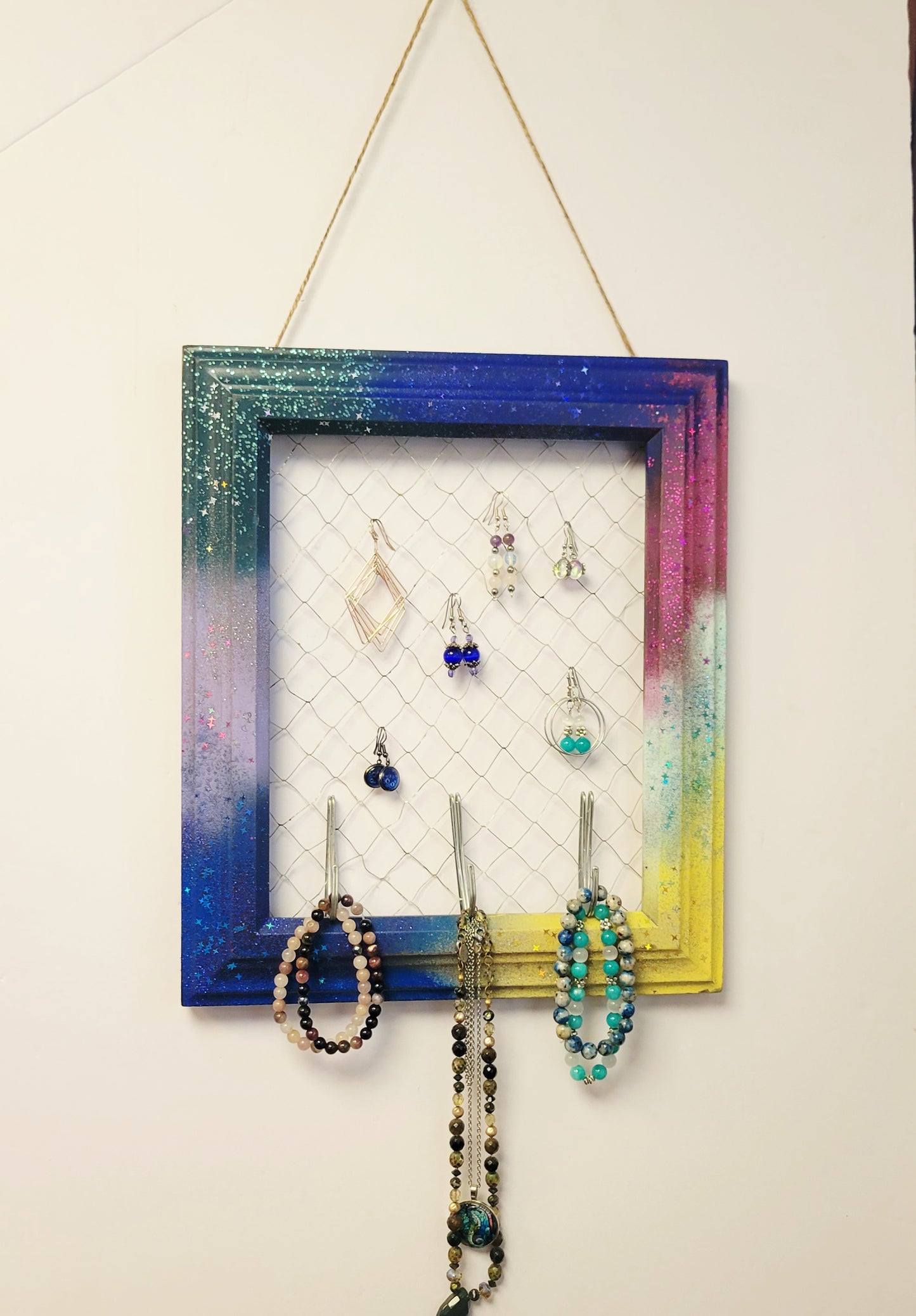 Upcycled photo frame jewelry organizer