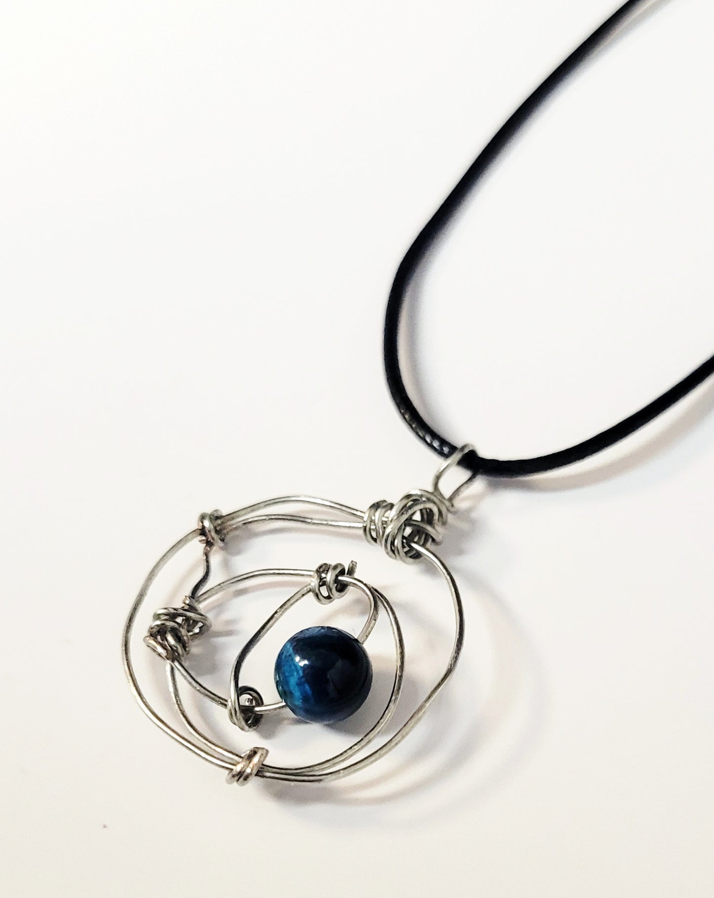 Minimalist knotted wire necklace with dragon vein agate bead